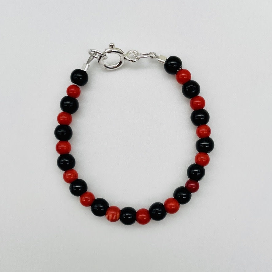 CH941BL Black Onyx & Red Dyed Bamboo coral Bracelet 5"