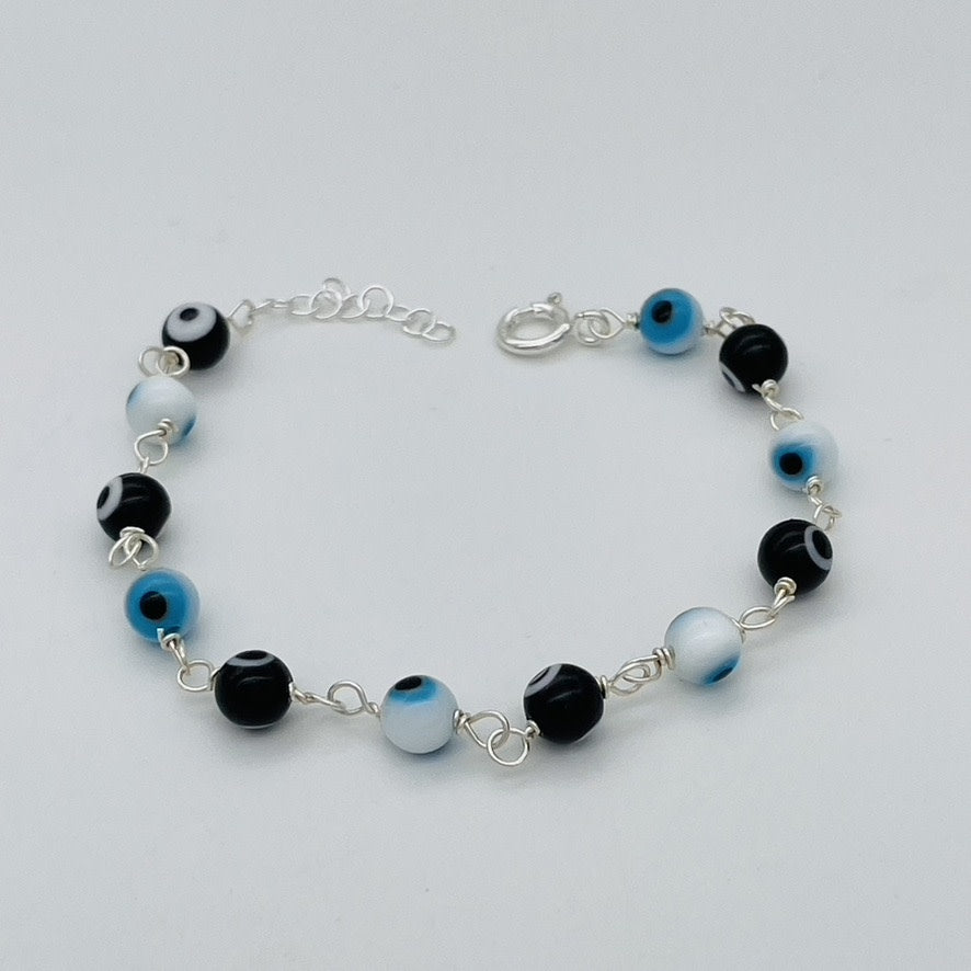 C1336BL white/ Black Eyes Bracelet 7"