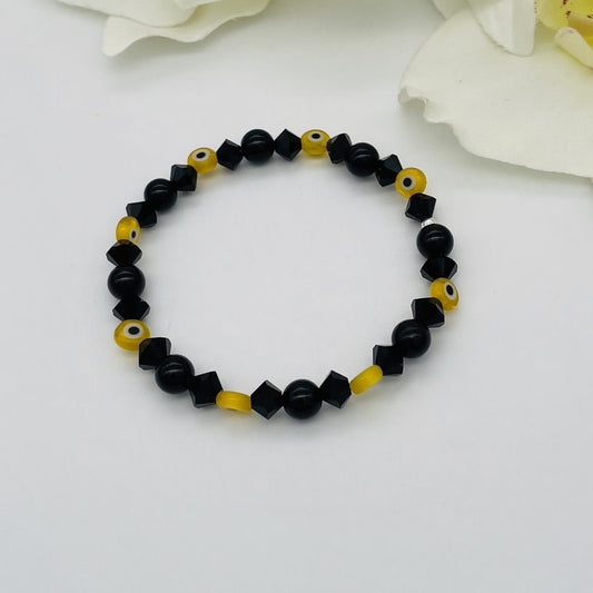 ST1663BL Onyx With Yellow Eyes Bracelet 7"