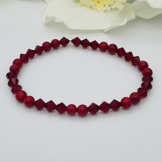 ST1504BL Red Dyed Bamboo Coral Bracelet 8"