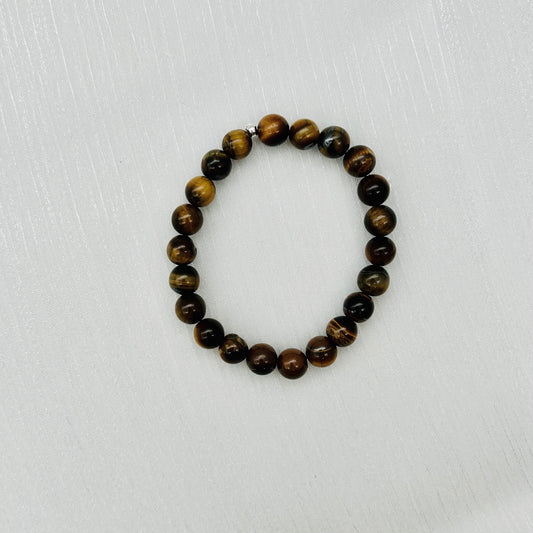 ST1023  8mm. X 7" Bracelet Tiger Eye