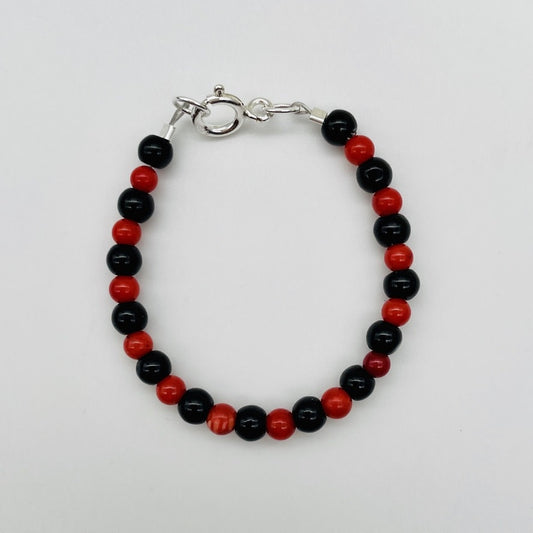 CH941BL Black Onyx & Red Dyed Bamboo coral Bracelet 5"