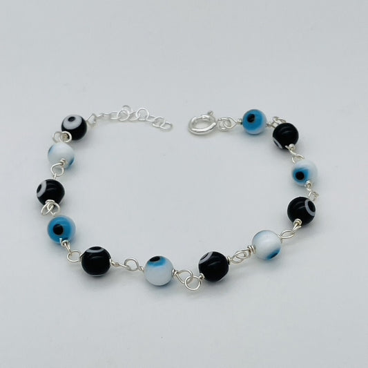 C1336BL white/ Black Eyes Bracelet  7"