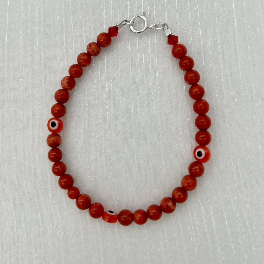 ST1762BL Dyed Red Bamboo Coral & Eyes Bracelet 7.5"