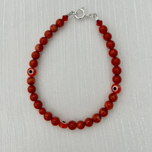 ST1762BL Dyed Red Bamboo Coral & Eyes Bracelet 7.5"