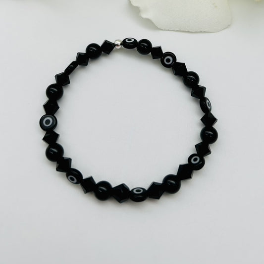 ST1663BL Black Onyx with black eyes bracelet 6.5"