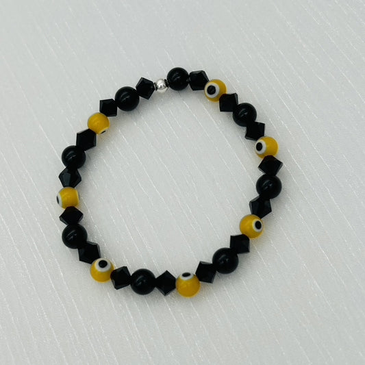 ST1755BL Black Onyx and Glass Yellow Eyes Bracelet 6.5"
