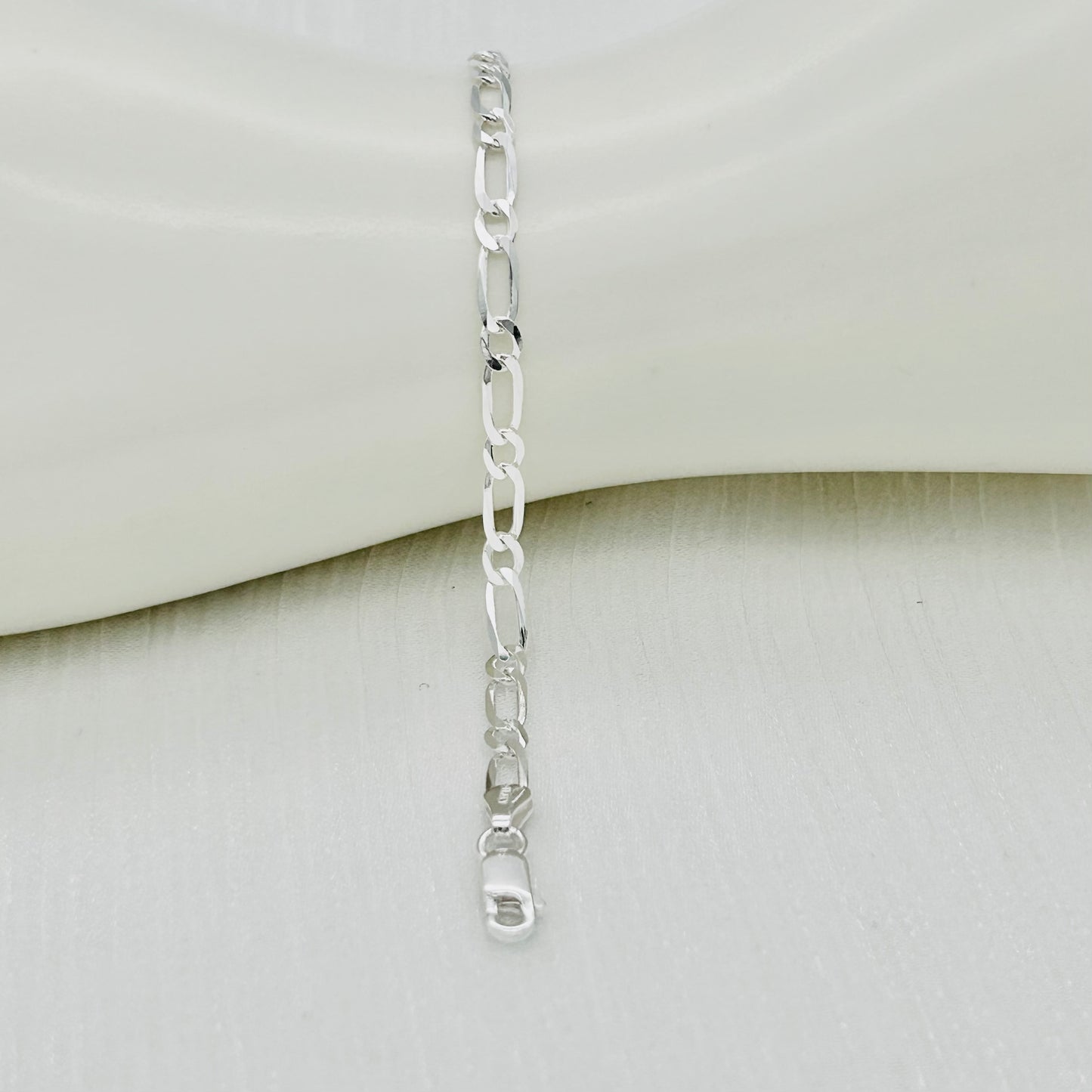 S727 Super Flat Figaro Bracelet 3.6mm. X 7"