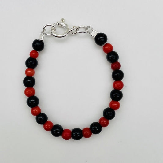 CH941BL Red Dyed bamboo coral & Black Onyx Bracelet  4.5"