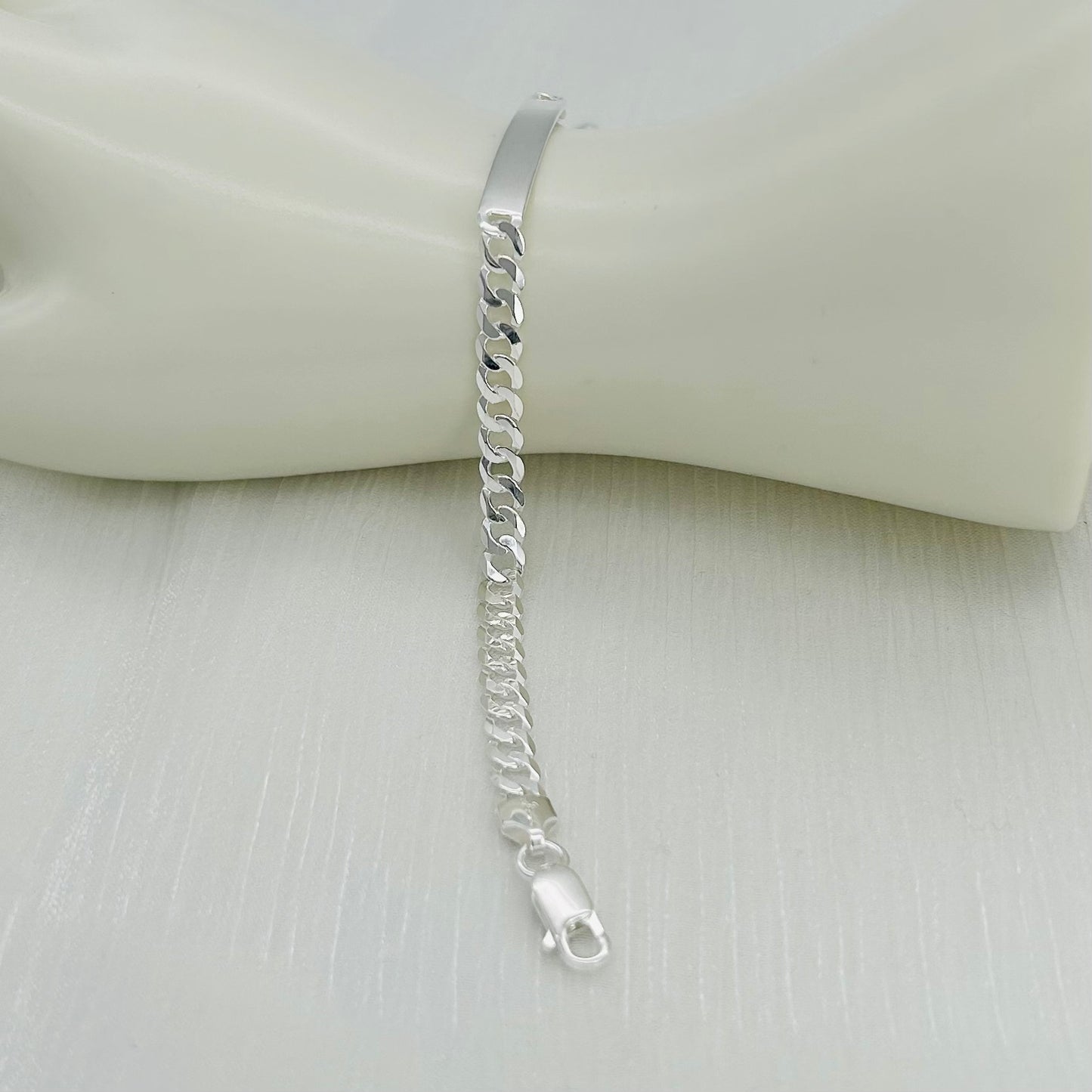 S1886 Flat Curb ID Bracelet 5.6mm. X 9"
