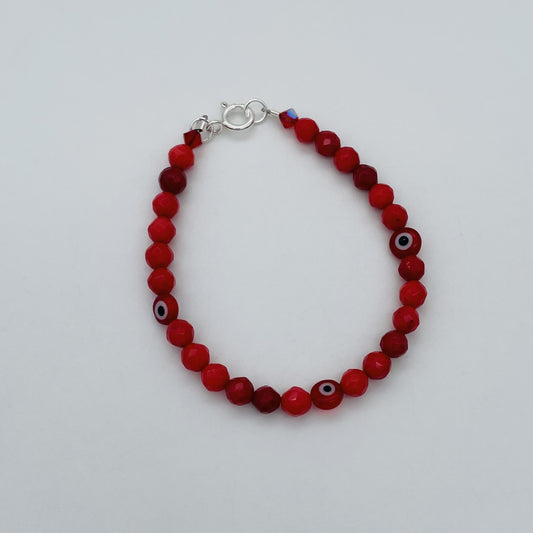 ST1762BL Red Dyed Bamboo Coral & Red Eyes Bracelet 7"