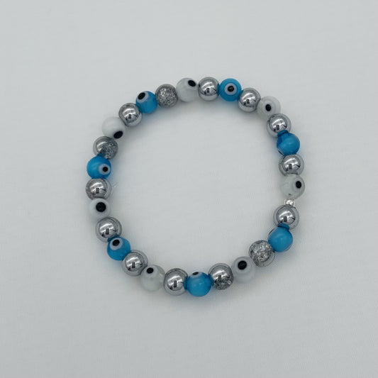 CH948BL Rock Crystals & Blue Eyes Bracelet 6"