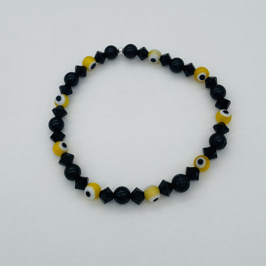 ST1755BL Yellow Eyes and Onyx Bracelet 8"