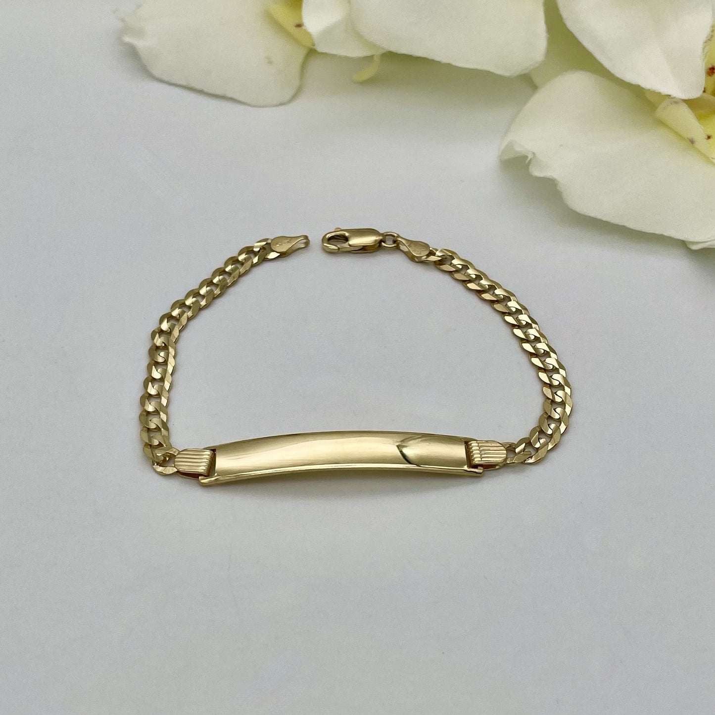 G185BL 14K Gold Curb Link Bracelet 7mm. X 7.5"