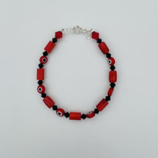 ST1793BL Red Dyed Bamboo Coral With Red Eyes Bracelet 8"
