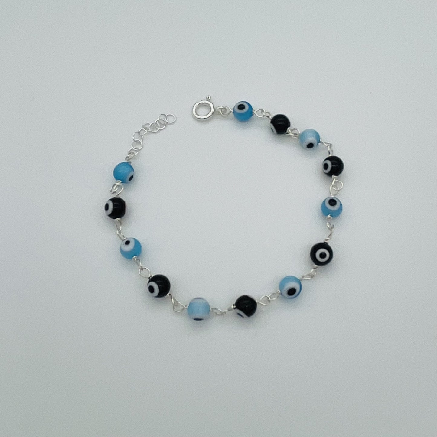C1336BL Blue & Black Eyes Bracelet  8"