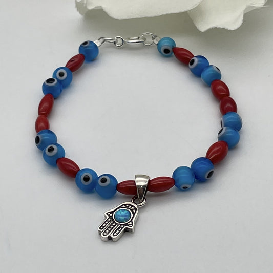 ST1816BL Red Dyed Bamboo Coral With Eyes Bracelet 7"