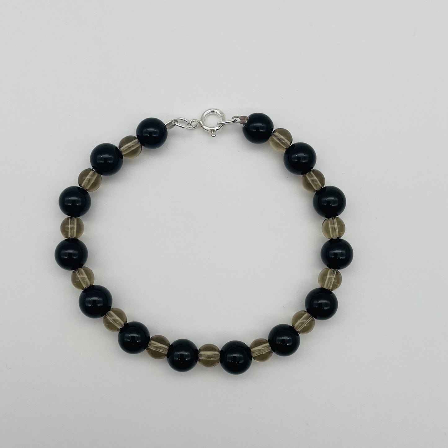 ST1184BL Bracelet Onyx & Smoky Bracelet 8"