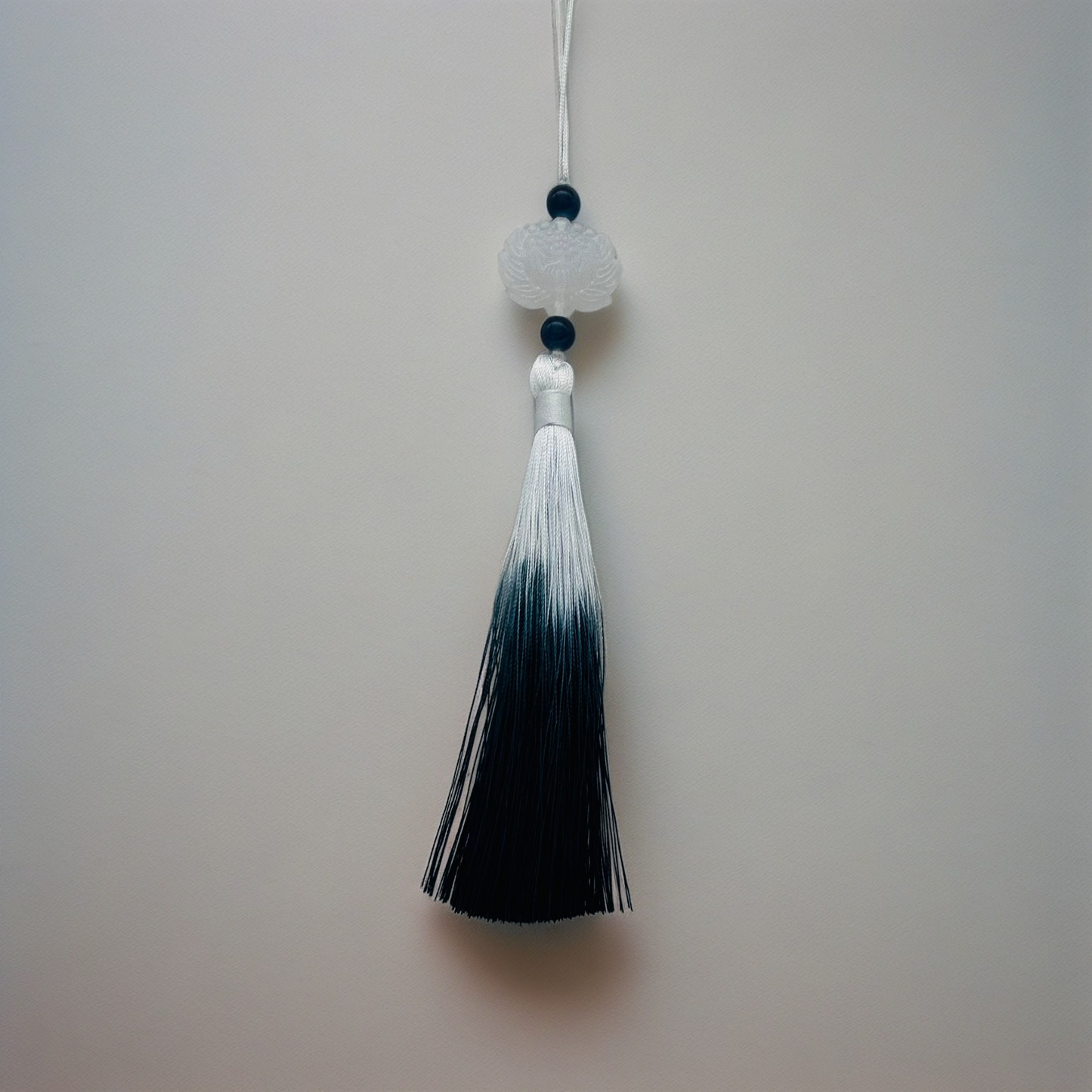 F454 Cell Phone Tassel Gray