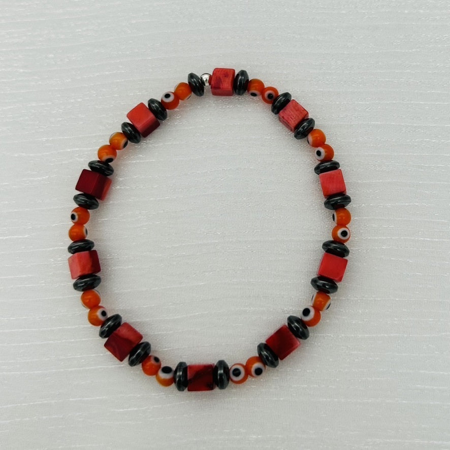 ST1864BL Red Dyed Bamboo Coral with Red Eyes Bracelet  6.5"